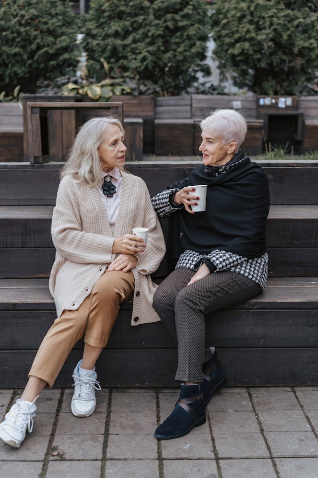 taxes on inheritances, image of two older women chatting outdoors
