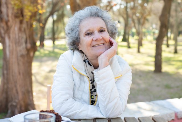 Medicaid planning, image of a smiling senior woman outside